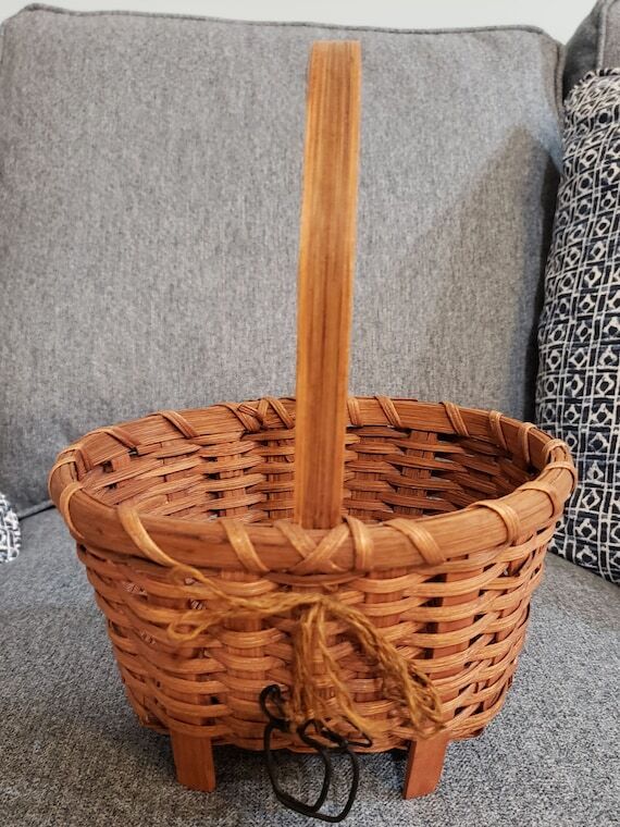 Basket with apple decoration and handle...