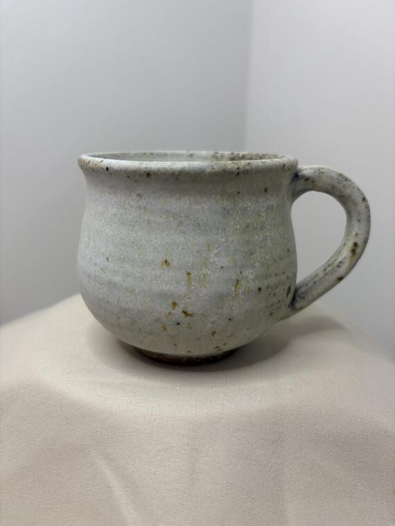 Handmade Cream Pottery Mugs...