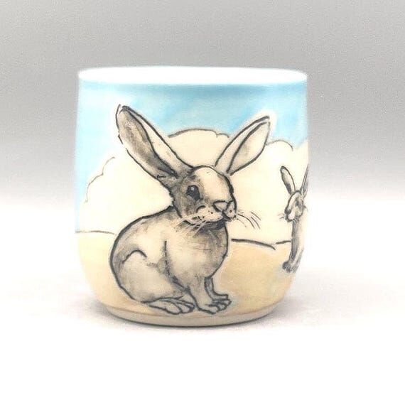 Small handmade, handpainted ceramic mug; two ...