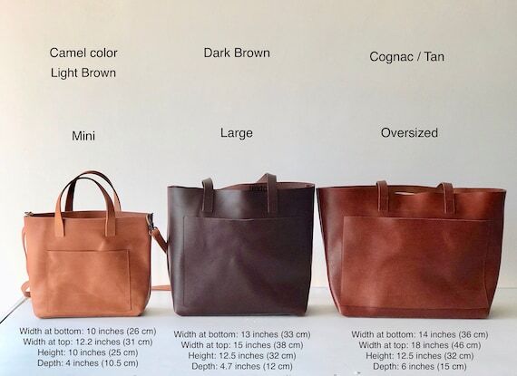 Leather tote bag with large outside pocket. 4...