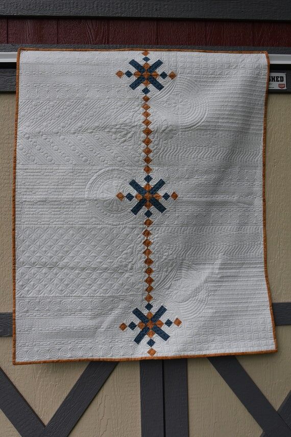 Handmade quilt in white, gold and turquoise w...