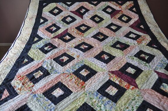 A handmade quilt called Magic Boxes ( lap qui...