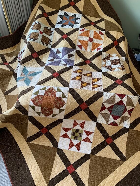 Sale-“Cabin Sampler” Handmade queen quilt...