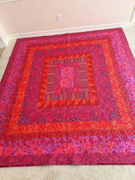 Large bright magenta quilt...