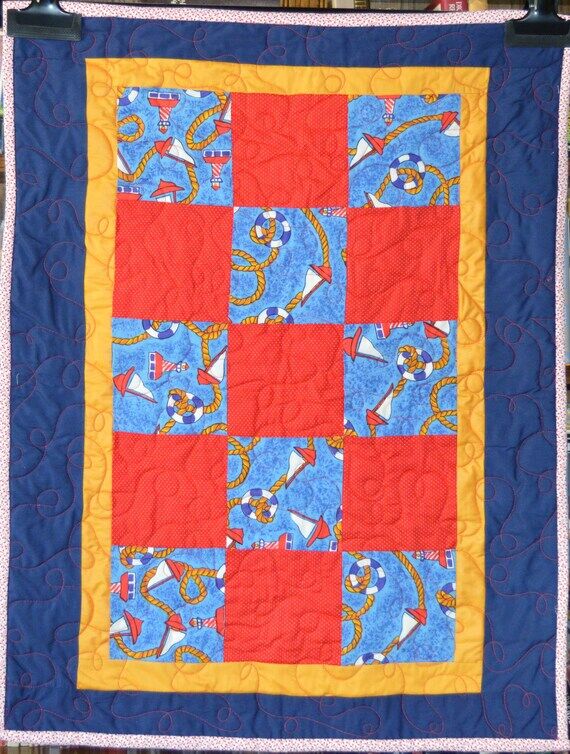 Nautical-themed small quilt in primary colors...