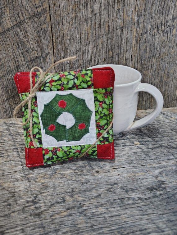 Quilted Christmas wreath coasters. Handmade w...
