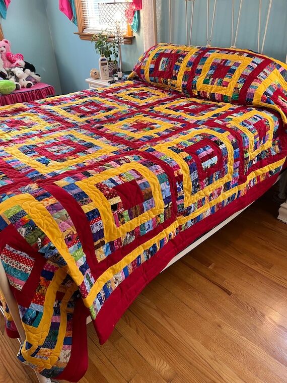 Handmade quilt titled Aun Granny’s Coat of ...