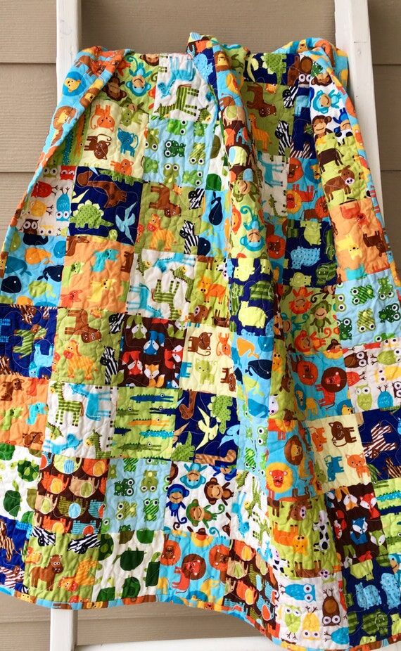 Ready to ship modern Zoologie baby quilt, ani...