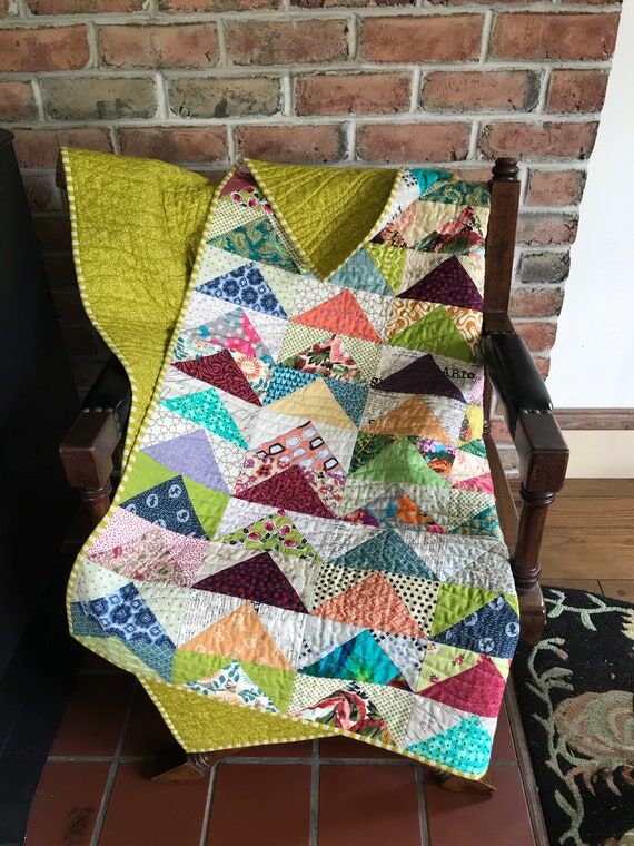 Modern quilted throw with vibrant jewel tone ...