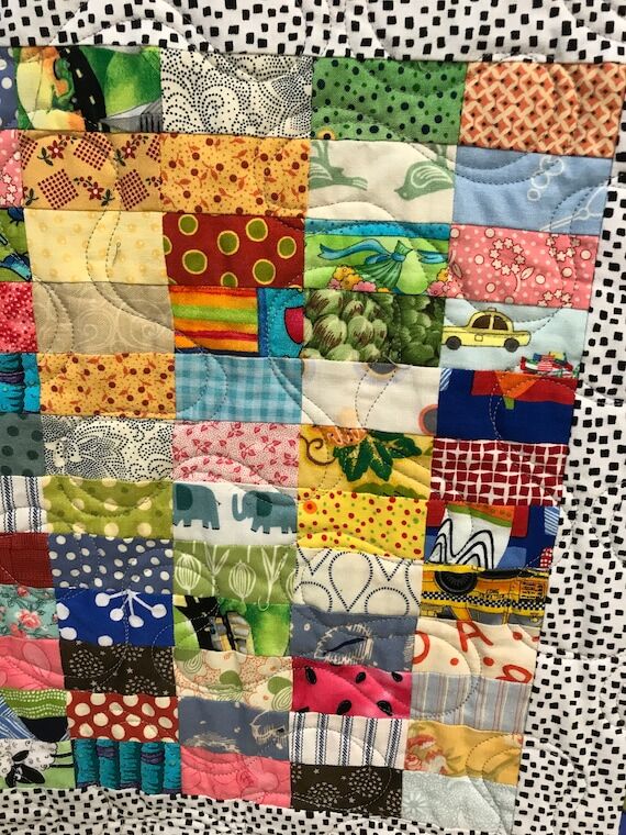 Scrappy, patchwork and colorful quilt...