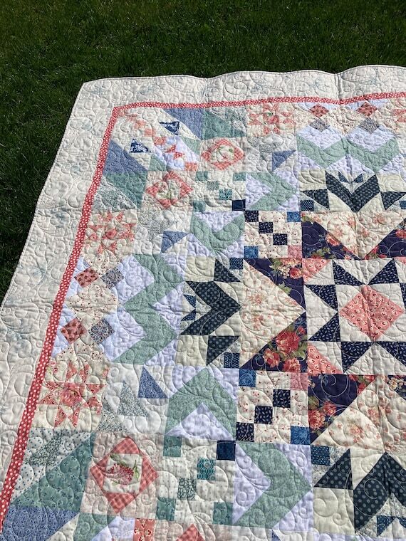 Medallion Quilt in shades of blue, pink and w...