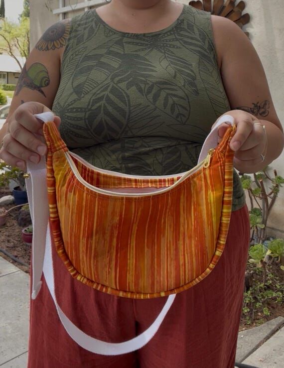 Mini Orange Stripes Crescent Bag...