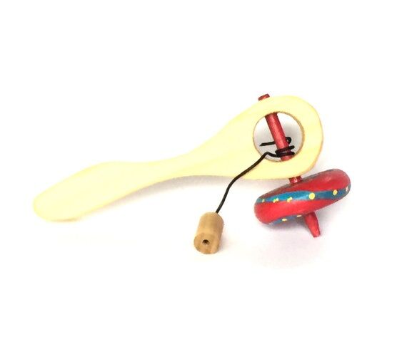 Spinning Top with launcher red/blue and yello...