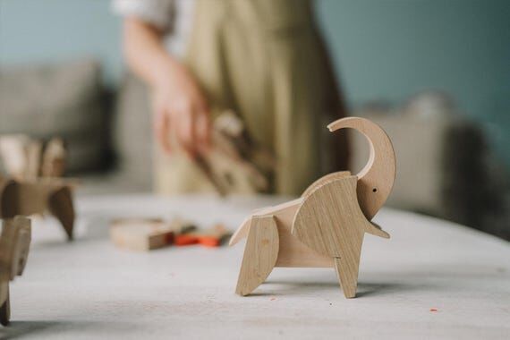 Wooden elephant puzzle gift with pink magnets...