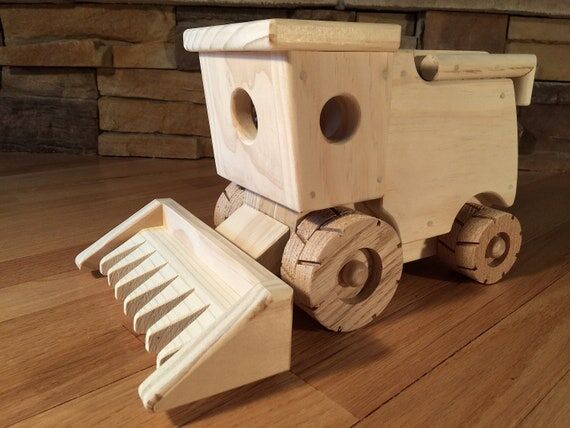 Handmade Wooden farm combine toy...