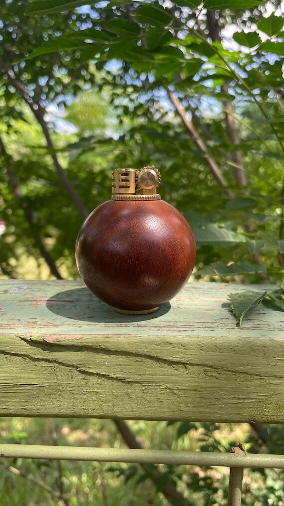 Wood turned vintage lighter...