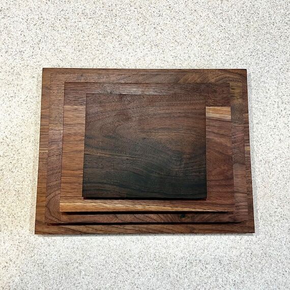Set of 4 cutting boards made from walnut, map...