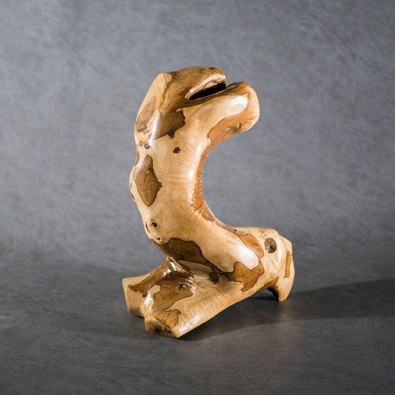 Handmade abstract sculpture from olive wood...