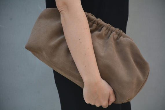 Handmade Suede leather Dumpling clutch in Kha...