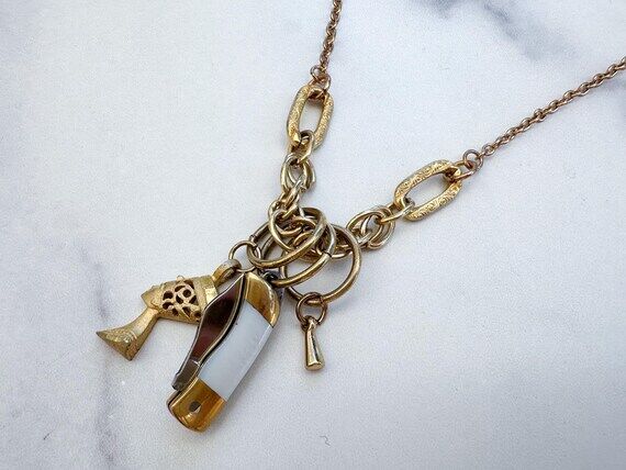Nefertiti Knife Necklace - Gold-Tone Folding ...