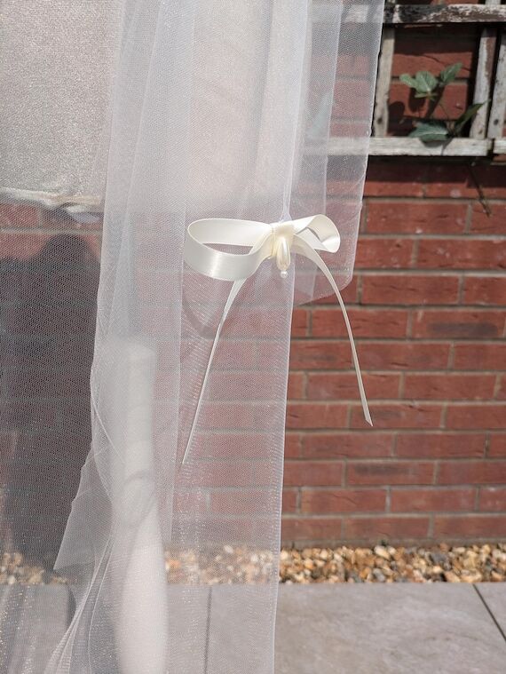Handmade ribbon bow bridal veil...