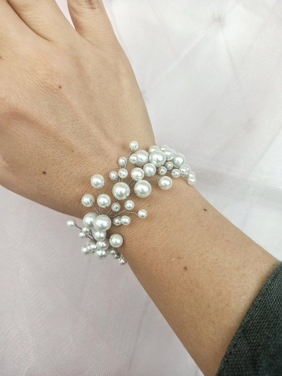 White romantic wristband of pearl, placer pea...