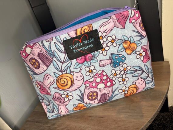 Novelty snail and mushroom makeup zipped bag,...