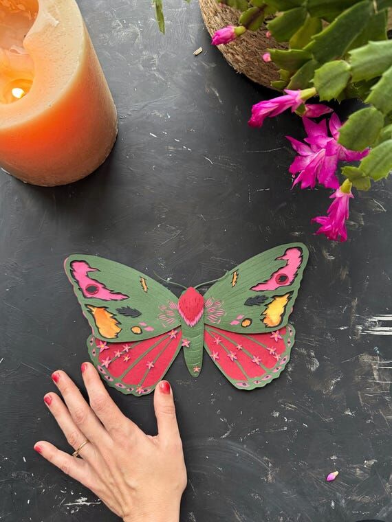 Collage art, paper cutting, butterfly with sm...