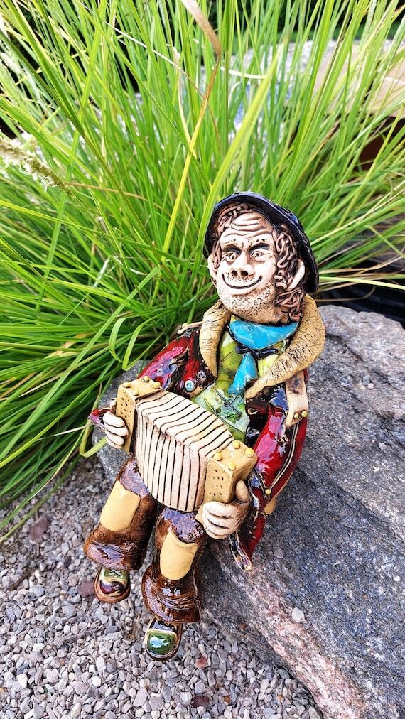 Man with an accordion- funny ceramic figurine...