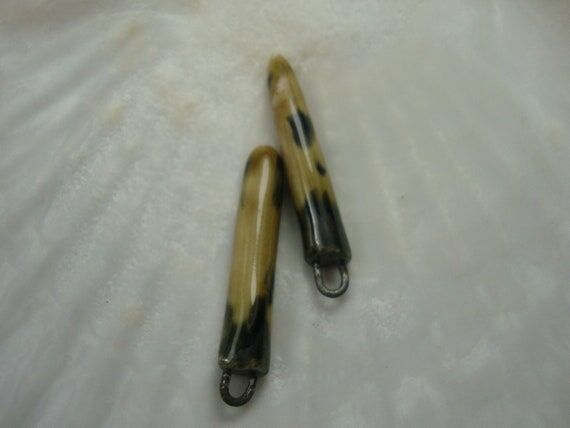 Brown, tan, and metallic color handmade porce...