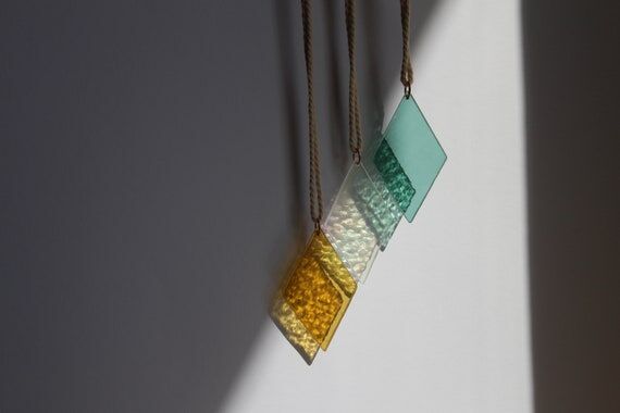 Stained glass diamonds as window decoration o...