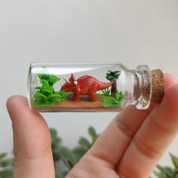 cute triceratops in a glass-bottle / unique m...