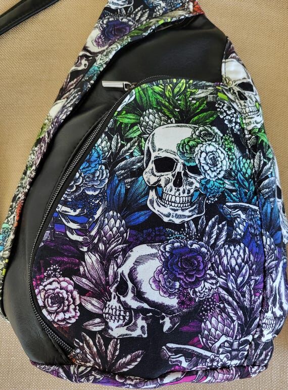 Rainbow colored Skulls and Flowers combine wi...