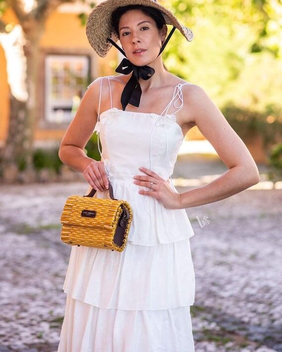 Handwoven Yellow Straw Basket Bag: Portuguese...