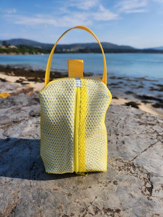 Yellow Mesh Toiletry Bag and Blue Striped Cot...