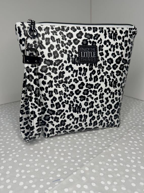 Leopard Print Vinyl Wristlet Bag \| Black & W...