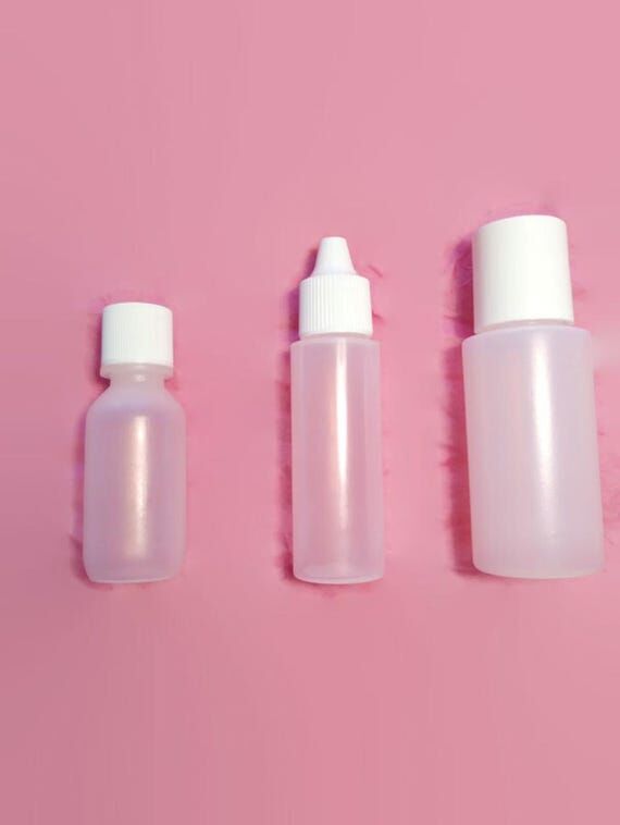 Small Plastic Bottle Assorted Travel Sizes Sq...