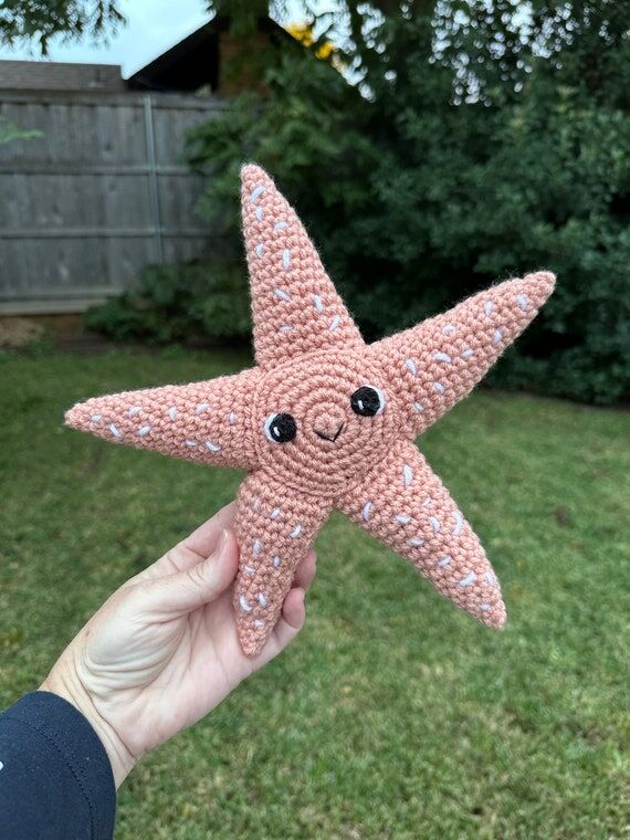 Peach colored handmade crochet sea star/Starf...