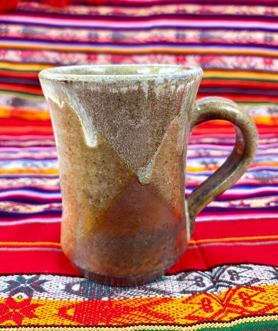 12 oz wood fired ceramic mug. Wood firing cre...