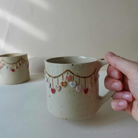 Handmade Ceramic Mug with Embossed Hearts: Po...