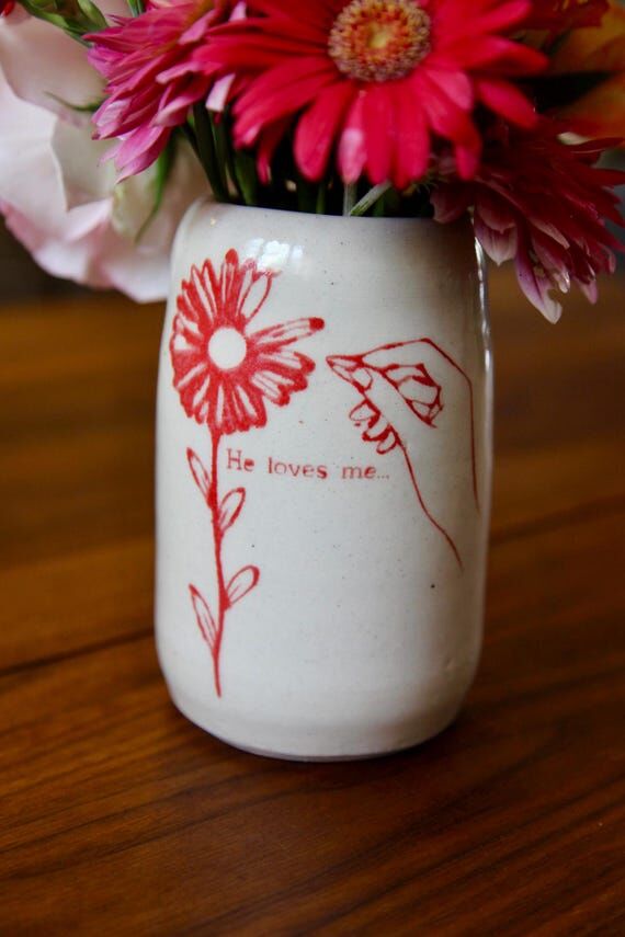 Ceramic red and white he loves me daisy flowe...