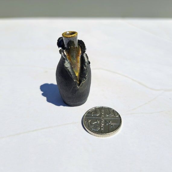 Handmade miniature ceramic vase in black/gree...